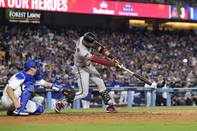 Arizona Diamondbacks' Ketel Marte walks back to the dugout after striking  out against the Los Angeles Dodgers during the first inning of a baseball  game Thursday, April 6, 2023, in Phoenix. (AP