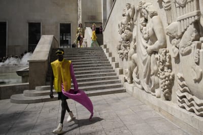 Three-story tall Virgil Abloh statue at his spring 2022 Louis