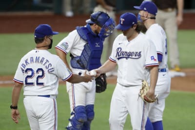 Texas Rangers' Todd Frazier follows through on a home run swing