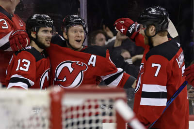 Download Caption: Celebrating New Jersey Devils' Victory in the