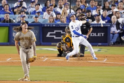 Dodgers' 12-game win streak ends; Singer, Royals blank LA