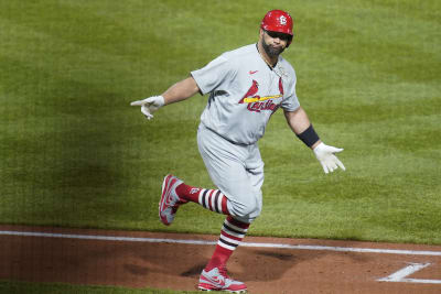 Cardinals reliever Gallegos gets wiped down by umpire after using rosin bag  on his left arm