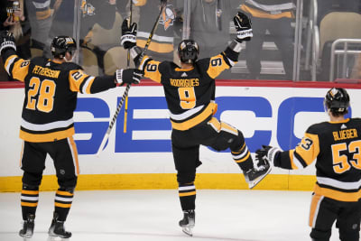 Panarin lifts Rangers past Penguins 4-3 in OT in Game 7
