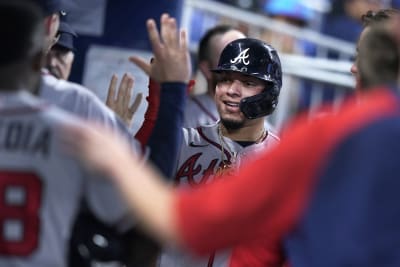 Photos: Braves break out red uniforms, beat Marlins