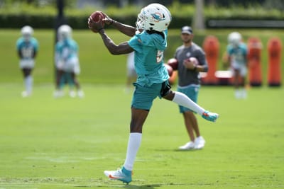 Miami Dolphins cornerback Jalen Ramsey runs drop back drills