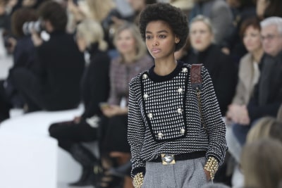 Vuitton stages style history wall, Chanel goes pared-down