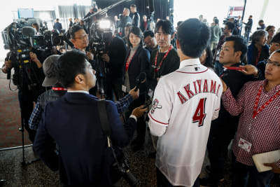 Reds outfielder Akiyama released