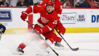 Henrik Zetterberg of the Detroit Red Wings skates up ice with the News  Photo - Getty Images