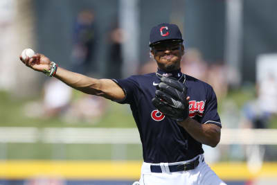 Cleveland Indians' Francisco Lindor poses with his teams baseball