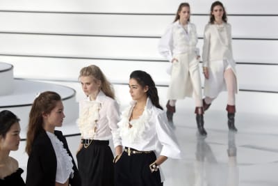 Vuitton stages style history wall, Chanel goes pared-down