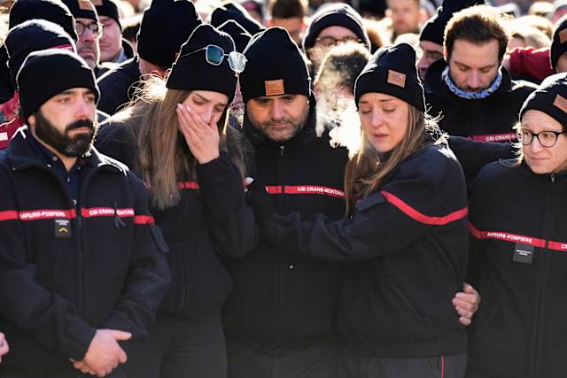 Hundreds march in silence to honor victims of Swiss bar fire that ...