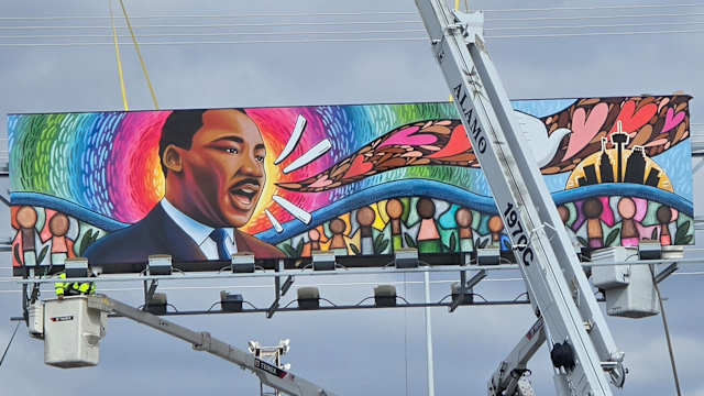 City crews brave cold, strong winds to install new artwork on San