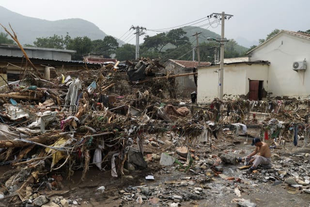 Deadly flooding in China worsens as rescues and evacuations intensify