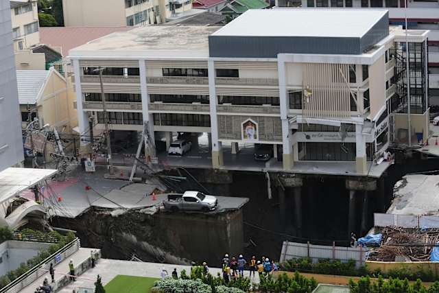 A Bangkok road collapse creates a sinkhole disrupting traffic and