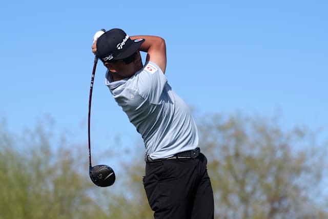 Hisatsune chips in for birdie after water ball, shoots 63 to take