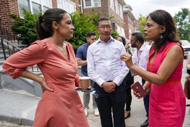aoc orange dress Ocasio-Cortez navigates the expectations that come with fame