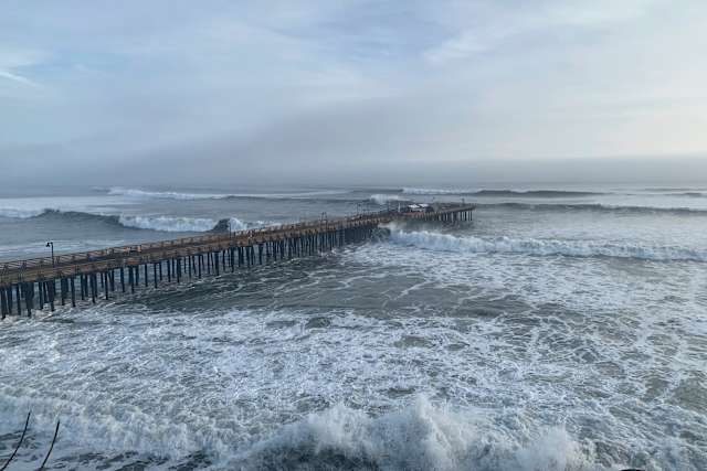 Major storm pounds California's central coast, blamed for man's death and  partially collapsing pier