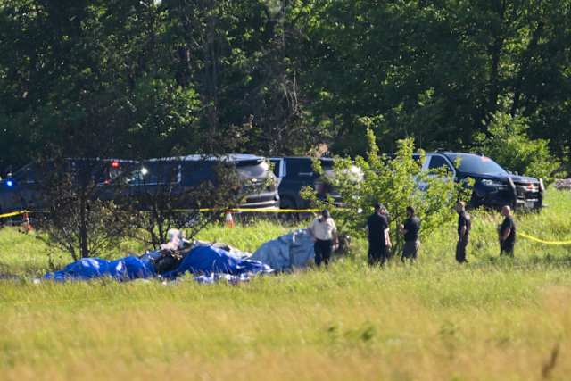 Emergency personnel at the crash site in Butler, Missouri