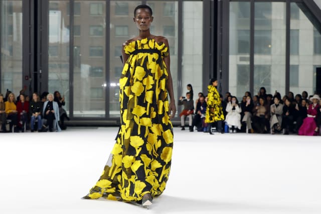 Carolina Herrera brings big bows, pops of color and drama