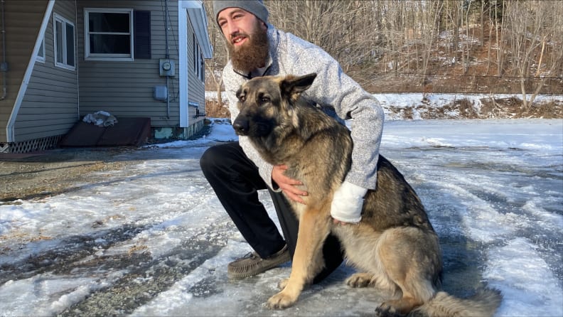 Tinsley with her owner, Cam Laundry, who survived a crash after Tinsley led rescuers to the crash site.