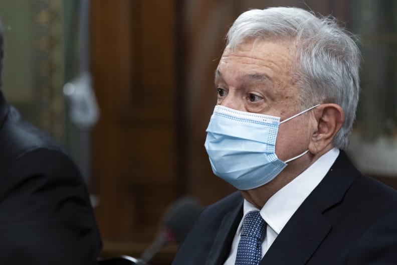 FILE - Mexican President Andres Manuel Lopez Obrador speaks during a meeting with Vice President Kamala Harris in her office at the Eisenhower Executive Office Building on the White House complex, Thursday, Nov. 18, 2021, in Washington. President Lopez Obrador announced on Monday, Jan. 10, 2022, that he has come down with COVID-19 a second time, as coronavirus infections spike in Mexico and virus tests become scarce. (AP Photo/Alex Brandon, File)