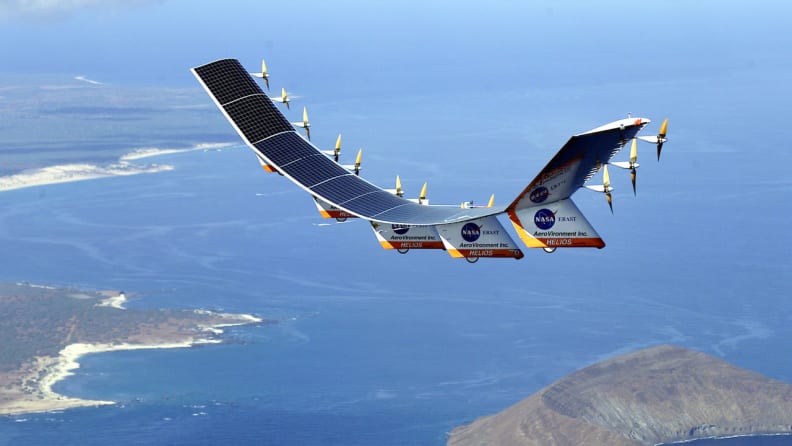 A solar-electric flying wing soars over the Hawaiian islands of Niihau and Lehua during a test flight in 2001 (NASA/Getty Images).