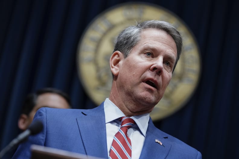 FILE - In this Dec. 4, 2019, file photo, Georgia Gov. Brian Kemp takes questions from the media at the Georgia state Capitol in Atlanta. (AP Photo/Elijah Nouvelage, File)