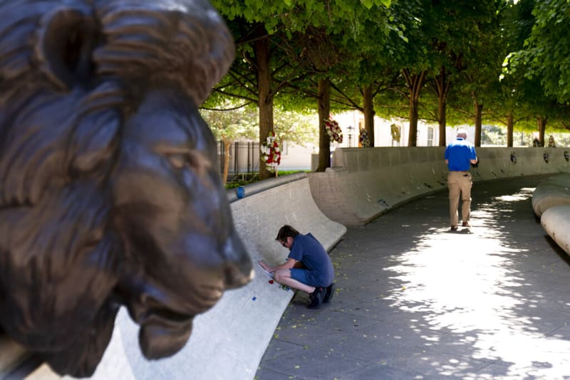 FILE - The walls at the National Law Enforcement Officer Memorial in Washington, D.C., are pictured on Thursday, May 13, 2021. (AP Photo/Andrew Harnik)