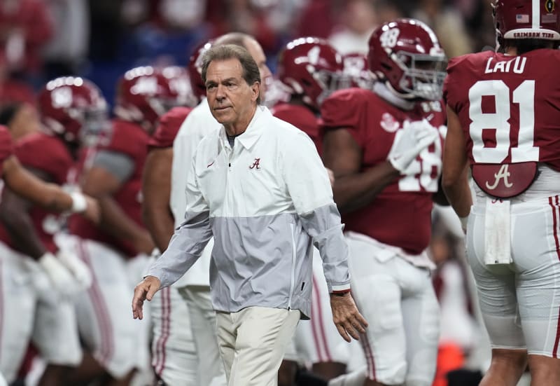 FILE - Alabama coach Nick Saban watches players warm up for the College Football Playoff championship NCAA football game against Georgia on Jan. 10, 2022, in Indianapolis. Saban is concerned about the current state of college football. He recently told The Associated Press "I don't think what were doing right now is a sustainable model. (AP Photo/Paul Sancya, File)