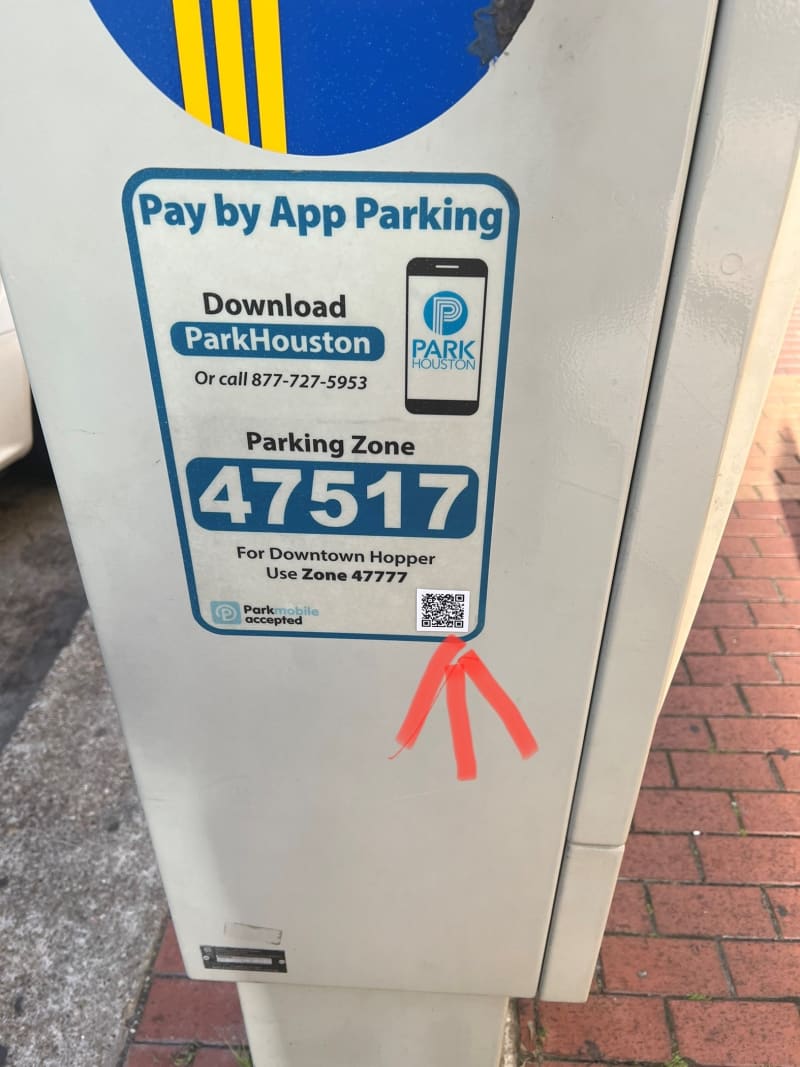 Fake QR code on the parking pay meter, as collected in Houston on Jan. 5, 2022.