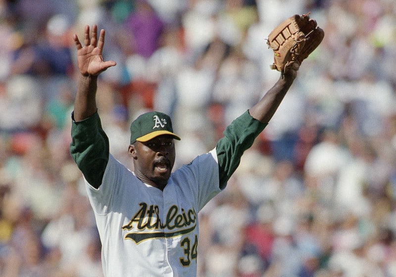 FILE - Oakland Athletics pitcher Dave Stewart celebrates the team's 6-2 victory over the Toronto Blue Jays in Game 5 of baseball's AL Championship Series on Oct. 12, 1992, in Oakland, Calif. Stewart is still waiting for his number retirement ceremony. Stewart, now 65, found out in August 2019 the club planned to retire his No. 34 jersey, then it didnt happen during the pandemic-shortened 2020 season or last year. The former World Series MVP and four-time 20-game winner posted on his Twitter account this week some frustration with his hometown team. (AP Photo/Eric Risberg, File)