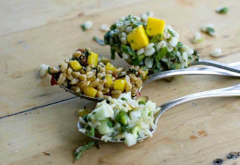 This June 6, 2011 photo shows, from top to bottom, tropical tabbouleh, Mediterranean tabbouleh and California tabbouleh in Concord, N.H. When you're assembling your salads for this years July Fourth celebration, consider this trio of naturally healthy tabboulehs.   (AP Photo/Matthew Mead)