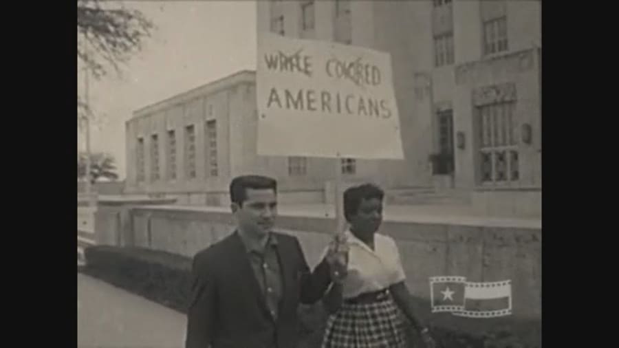 In 1960 outside Houston City Hall, demonstrators held signs calling for an end to desegregation. 