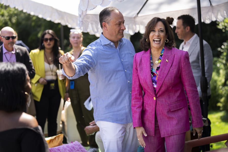 Vice President Kamala Harris with her husband Doug Emhoff, are seated during a 50th anniversary celebration of hip-hop at the Vice President's residence, Saturday, Sept. 9, 2023, in Washington. (AP Photo/Manuel Balce Ceneta)