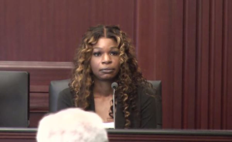 Kimberly Mobley, mother of Iyana Saywer, testifies on the stand during the murder trial of Johnathan Quiles who is accused of killing her daughter and her unborn granddaughter.