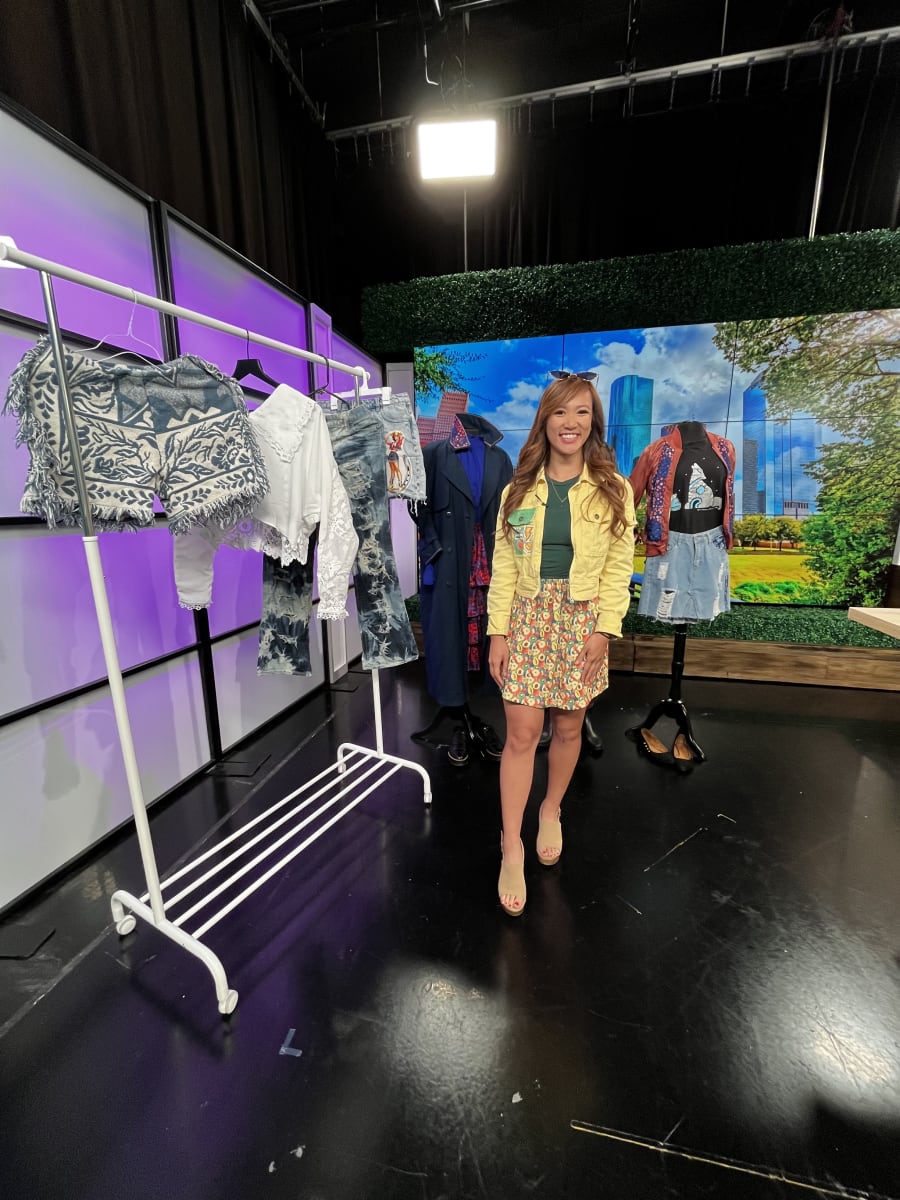 Hannah M. Le, founder of Re.Statement showcases upcycled clothes she sells online.