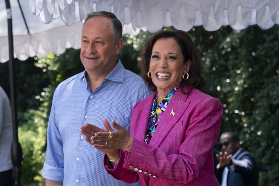 Vice President Kamala Harris with her husband Doug Emhoff dances to live hip-hop music during a 50th anniversary celebration of hip-hop at the Vice President's residence, Saturday, Sept. 9, 2023, in Washington. (AP Photo/Manuel Balce Ceneta)