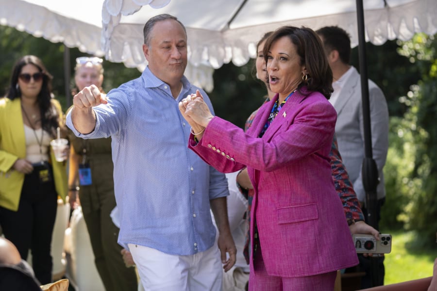 Vice President Kamala Harris and her husband Doug Emhoff dance to live hip-hop music during a 50th anniversary celebration of hip-hop at the Vice President's residence, Saturday, Sept. 9, 2023, in Washington. (AP Photo/Manuel Balce Ceneta)