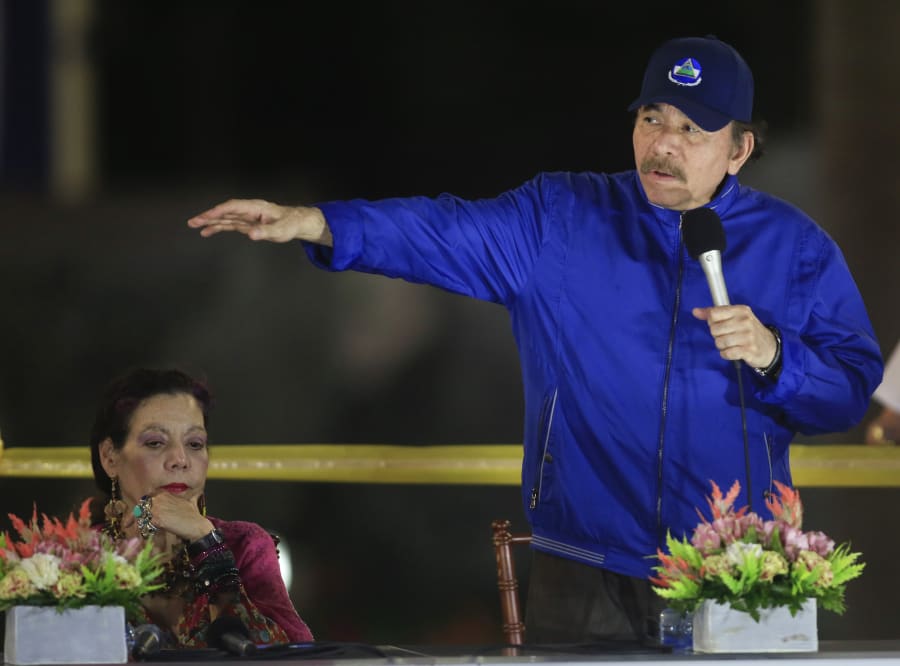 This file photo by Alfredo Ziga of The Associated Press shows Daniel Ortega, the Nicaraguan president, right, and Rosario Murillo, the first lady of Nicaragua, in 2019.