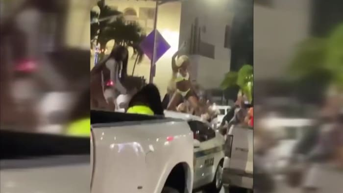 Wild night in Miami Beach: Women twerk on police car, 2 officers injured