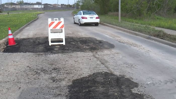 Huge hole left in busy roadway for months causing thousands of dollars in damage to vehicles - Vimarsana News