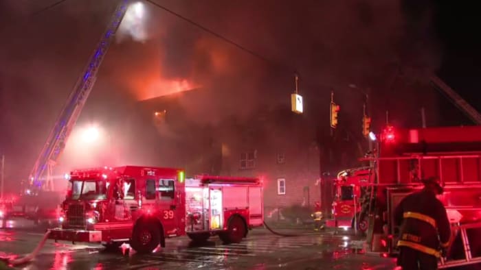 Detroit apartment fire displaces 20, man rams Eight Mile strip