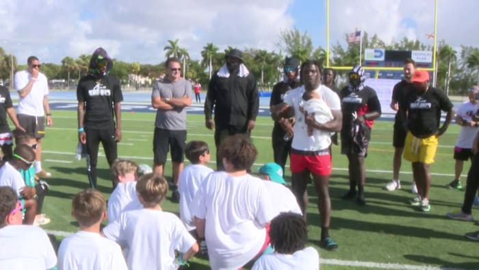 Dolphins receiver Tyreek Hill holds football camp at Tropical Park Stadium in Miami