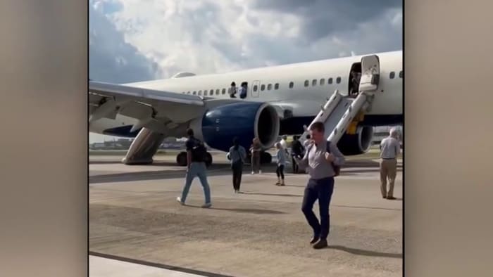 Delta passengers forced to use emergency slides after hard landing