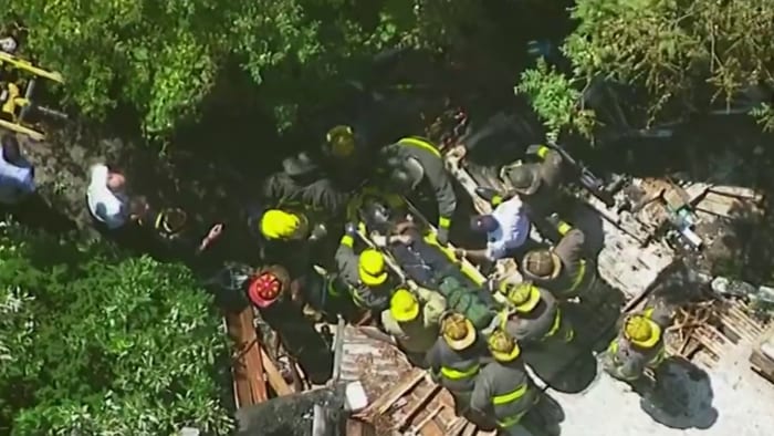 Inside the efforts to rescue a veteran firefighter who became trapped when Detroit house collapsed