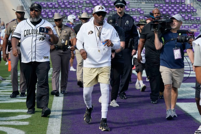 Colorado coach Deion Sanders comes away with new jewelry after