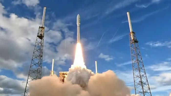 Rocket launch from cosmodrome. Fight of space rocket in blue sky