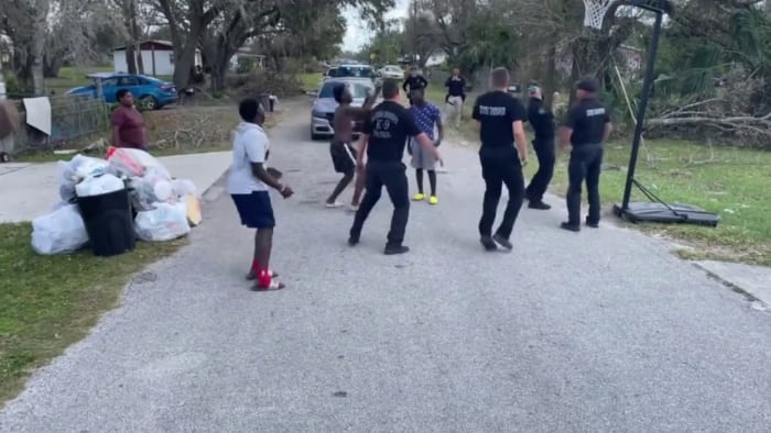 Video: Florida troopers take break from Hurricane Relief to play basketball with local kids