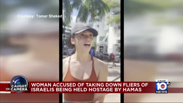 Woman defends actions after ripping down fliers of missing Israelis at Miami park