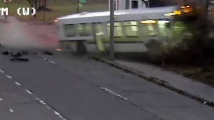 New surveillance video shows vehicle crashing into bus at intersection in Detroit